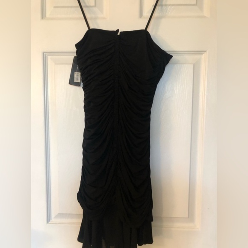 Max AZRIA strapless cocktail dress. S. Black with ruffle down middle and bottom
